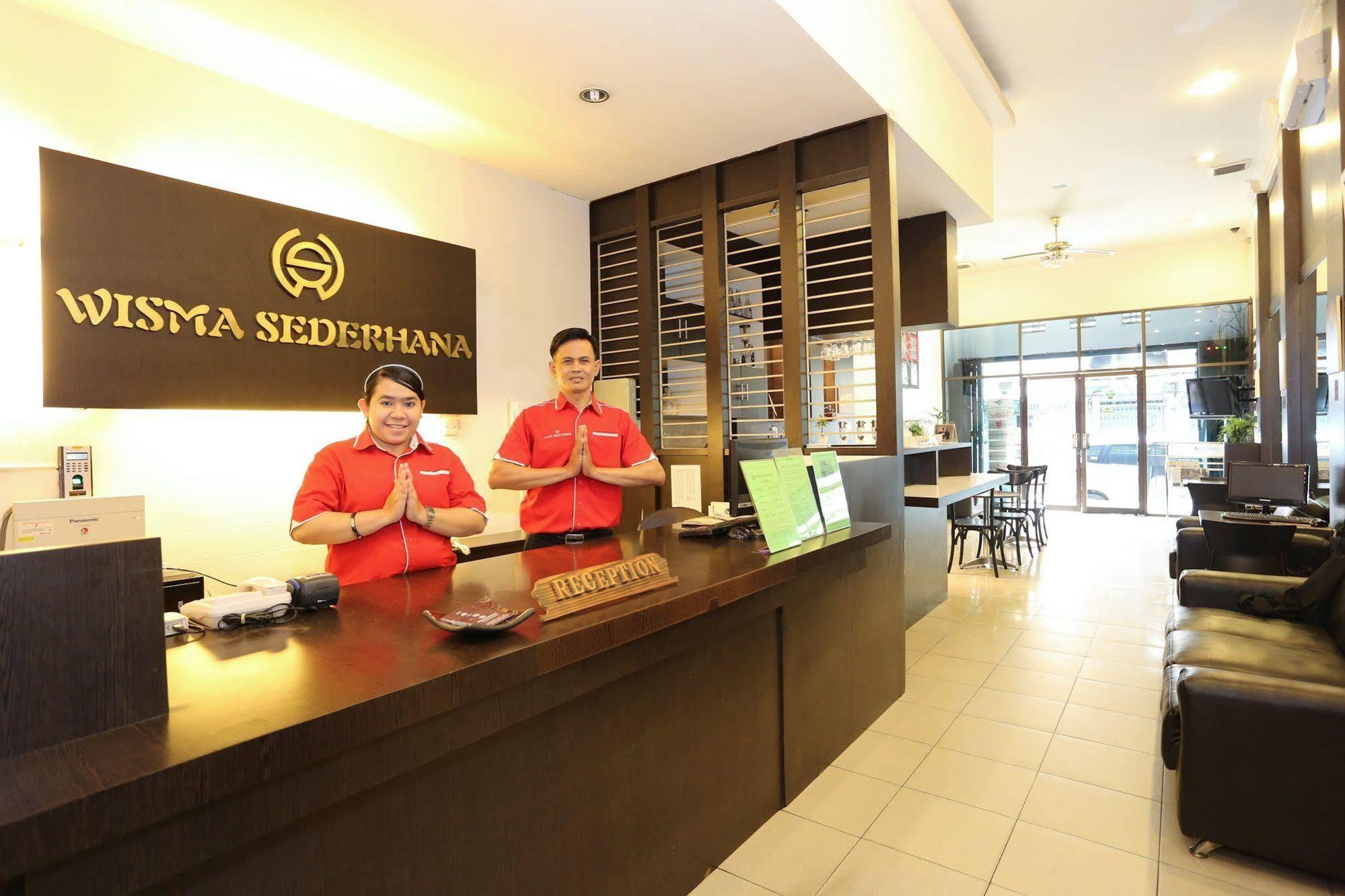 Wisma Sederhana Mitra Reddoorz Медан Екстериор снимка